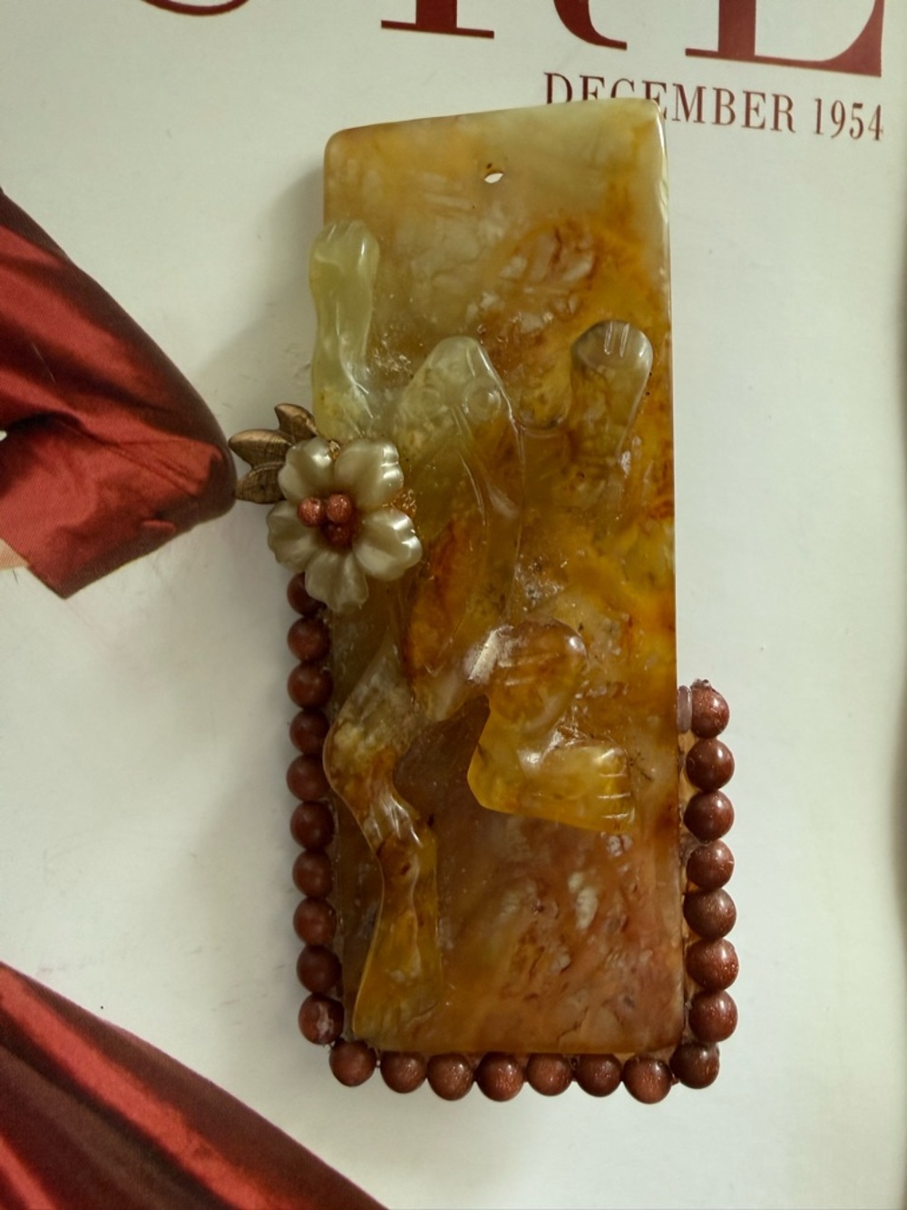 Carved Amber-Tone Chinese Handstone pendant Frog & Flower design